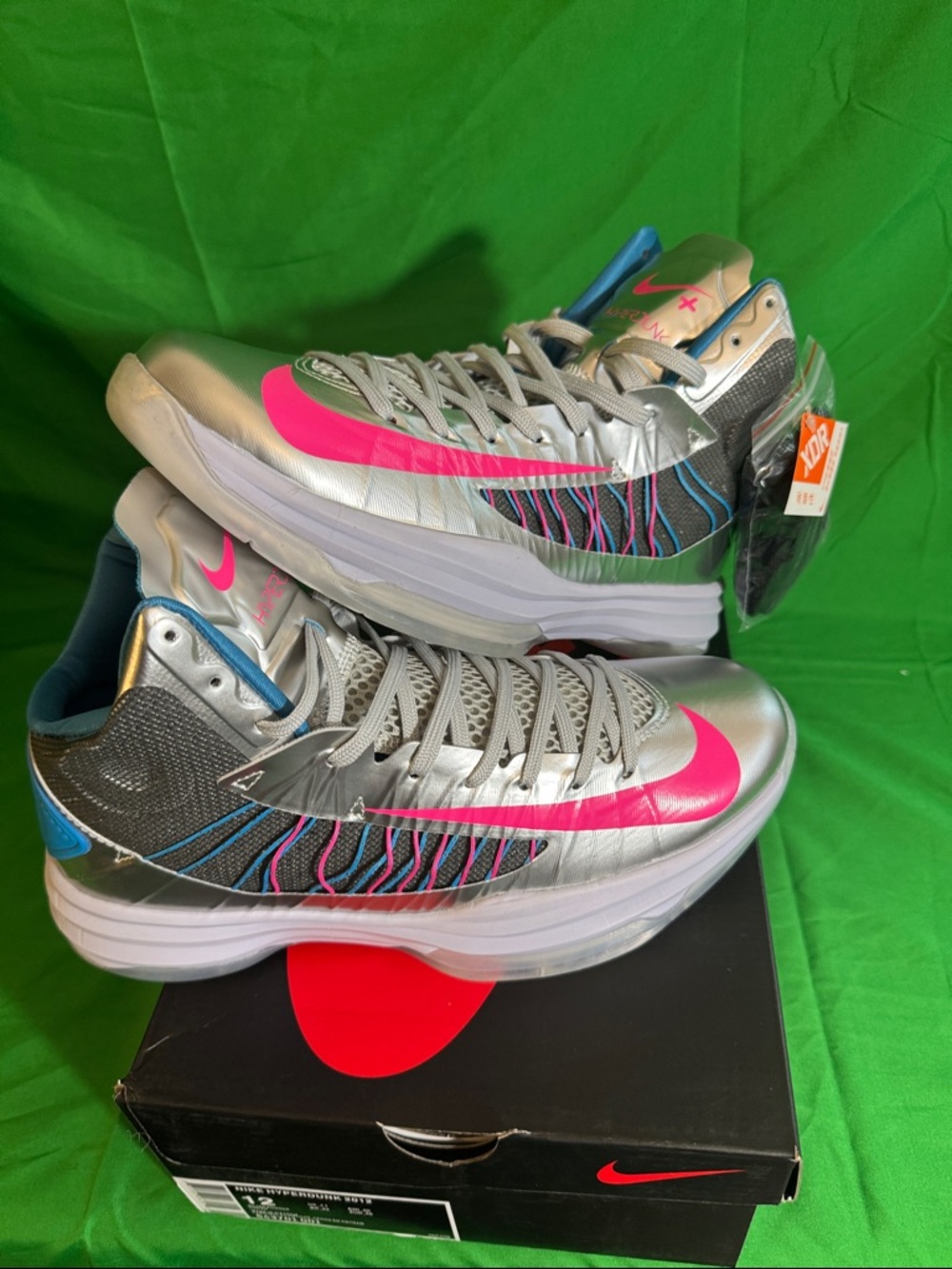 New! Nike Lunar Hyperdunk 2012. “Wolf Grey" metallic silver, vibrant pink, blue.
